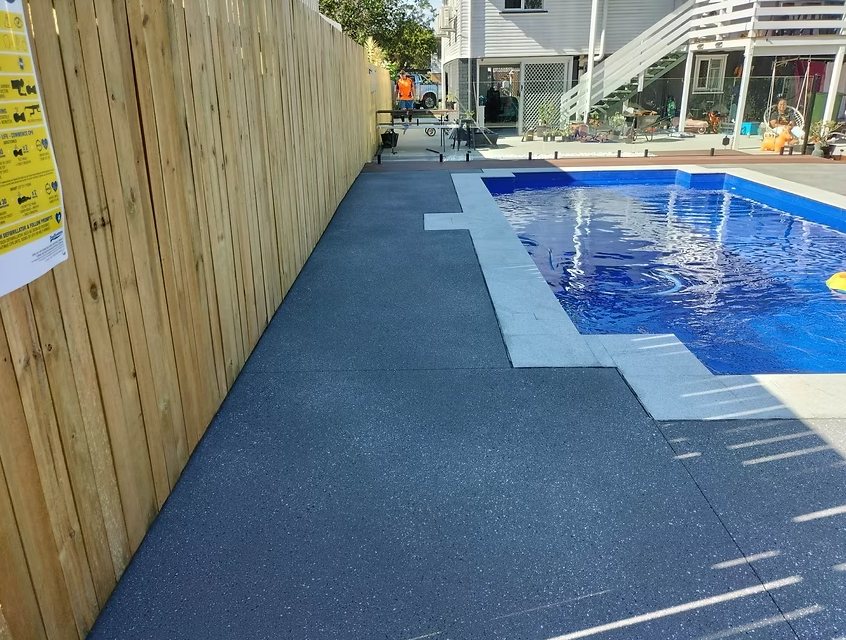 Charcoal concrete pool surround