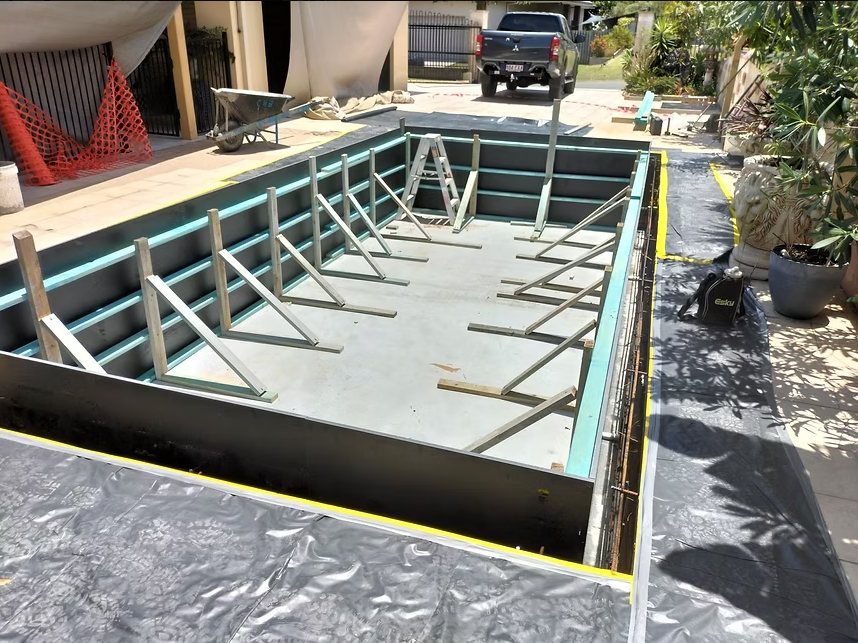 Formwork and steel set out before a pour